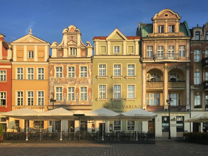 Colorful Tenements by the Street in Poznan